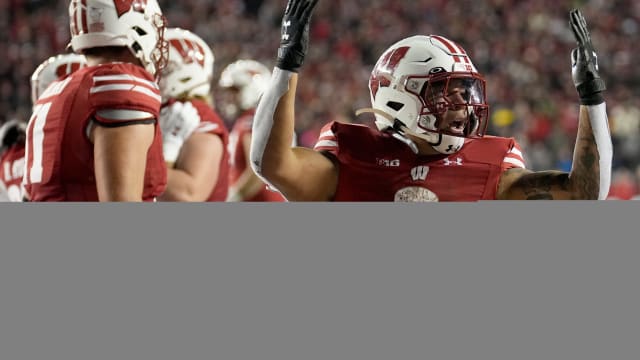 Braelon Allen TD celebration OT 2023 Nebraska vs Wisconsin football USATSI_21932757